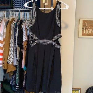 Short formal dress with side cutouts